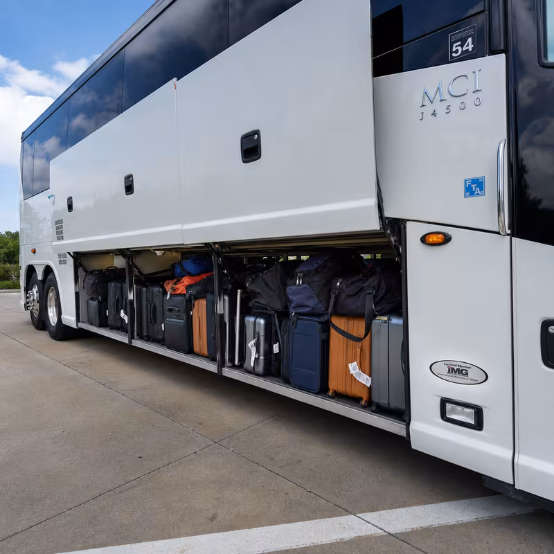 Party bus interior with wraparound leather seating and LED lighting in Shreveport