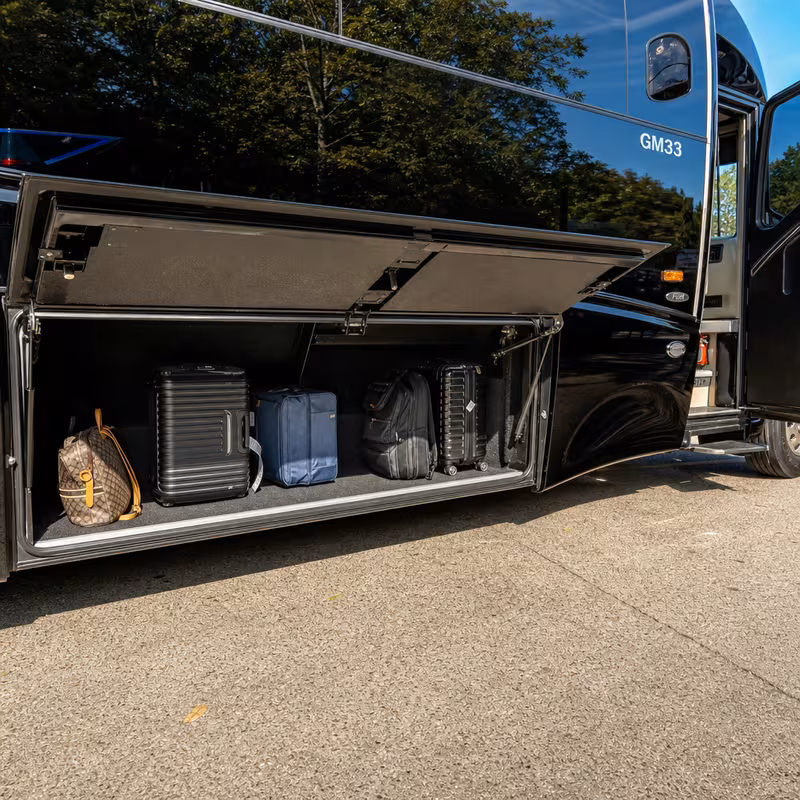 Party bus interior with wraparound leather seating and LED lighting in Shreveport