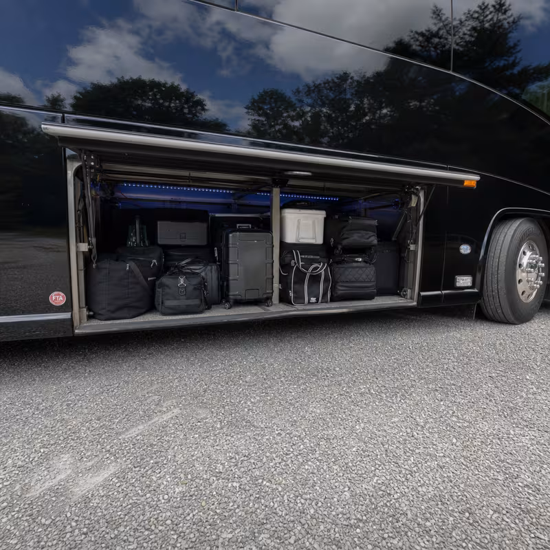 Party bus interior with wraparound leather seating and LED lighting in Shreveport